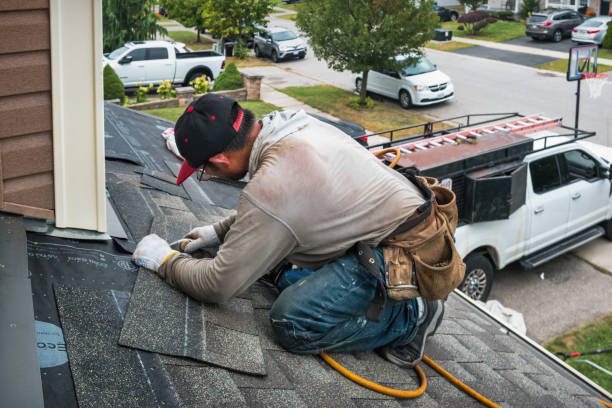 Professional Flat Roof Repair technician working in Ashley, OH